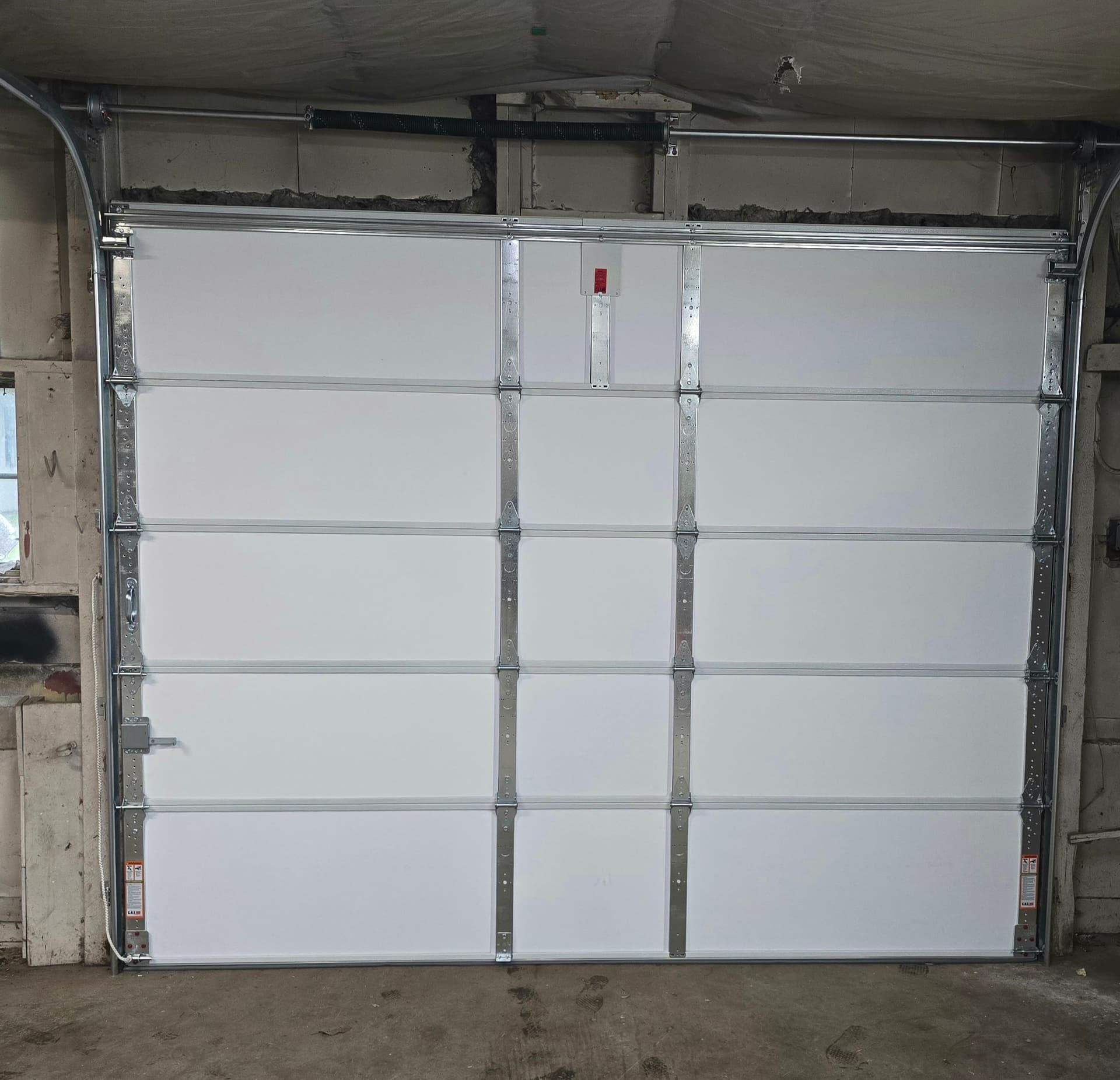 Gallery photos for Worn-Out Garage Door Replaced Clean in Saint Francis Minnesota: Image #3