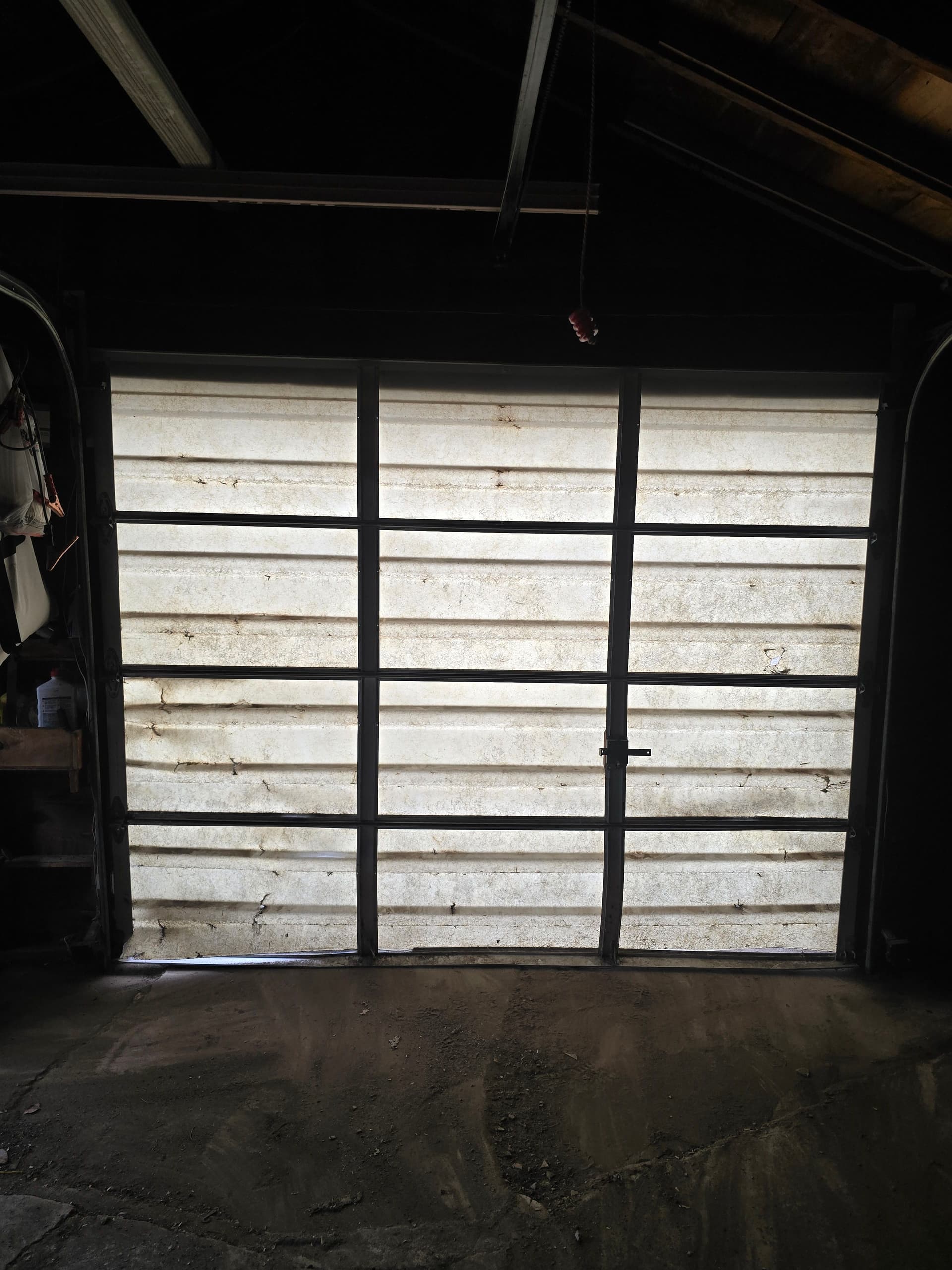Gallery photos for Dented and Worn Out Garage Door Gets a Full Replacement in Bloomington: Image #1